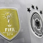 FIFA Badge und das DFB Logo auf dem neuen Deutschland Trikot 2016. AFP PHOTO / TOBIAS SCHWARZ