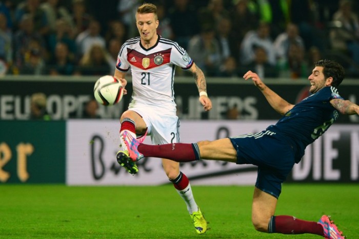 Marco Reus im DFB Trikot 2014 nach der WM gegen Argentinien - er trug die Rückennummer 21 (Foto AFP)